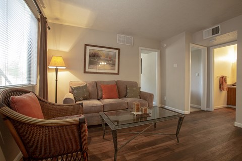 a living room with a couch and a coffee table